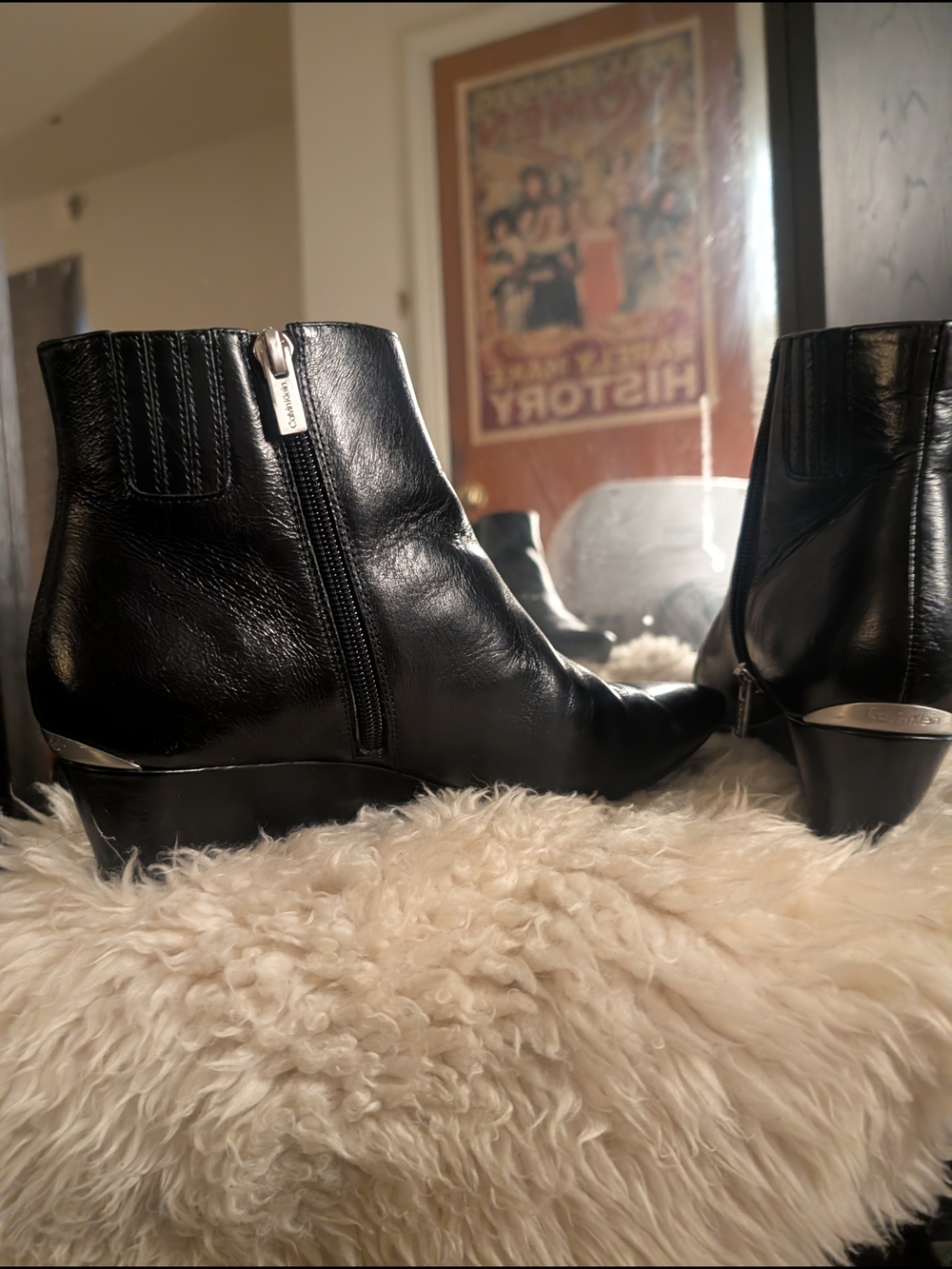 Calvin Klein Black Leather Ankle Boots with Side Zip and Metal Accent
